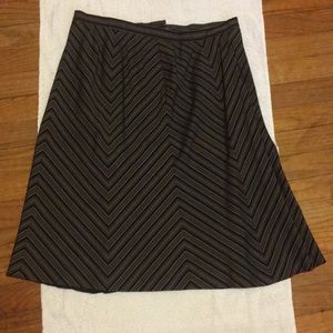 Black striped skirt.